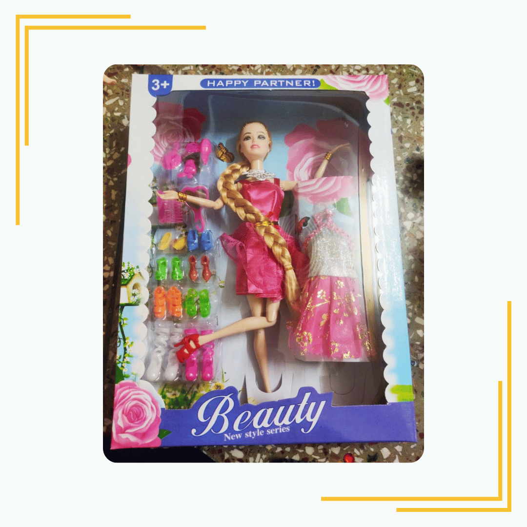 Barbie doll with complete fashion set and multiple shoes (Pink)